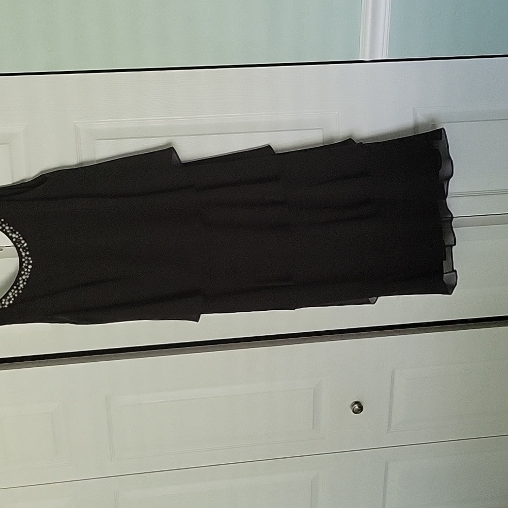 Black size 12 evening dress. Worn once to a wedding. Chevron